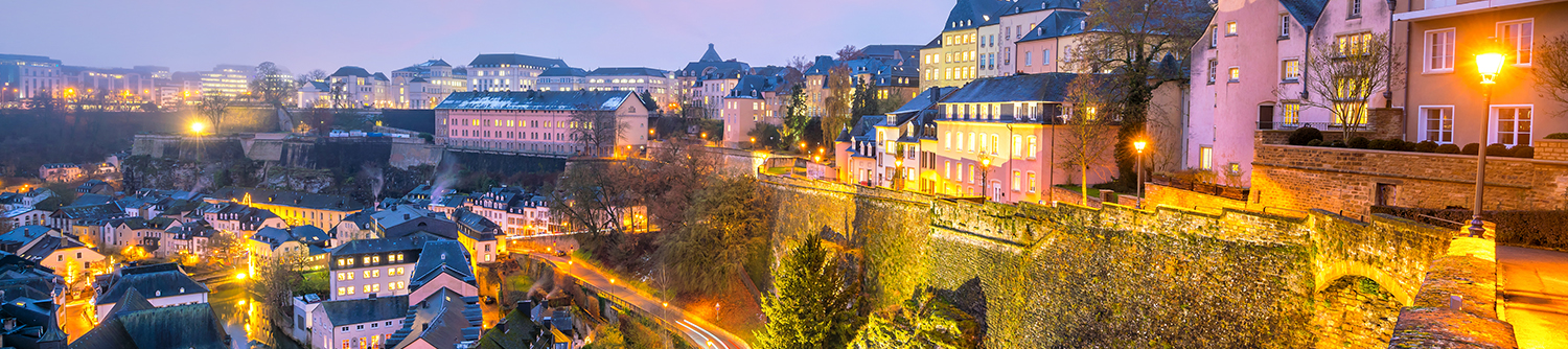 A city in Luxembourg lit up at night