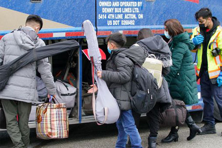 Afghan refugees arrive in Toronto on March 30, 2022.