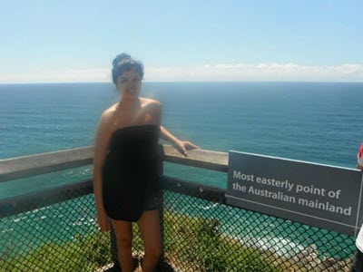 Image of Stefanie in front of the ocean in Australia.