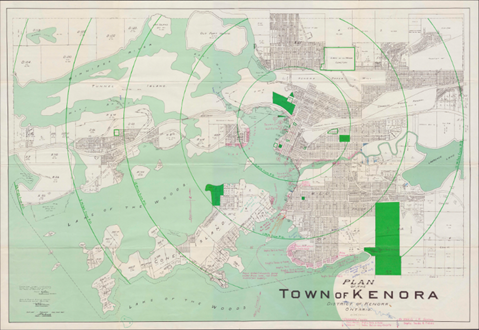 Plan d’une ville et de ses environs en vert avec quatre anneaux verts concentriques, le plus petit anneau indiquant la section du centre-ville.