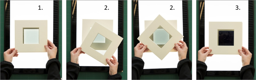 gloved hands superimposing and pivoting two assembled mat boards with polarizing films as described in steps 1 to 3