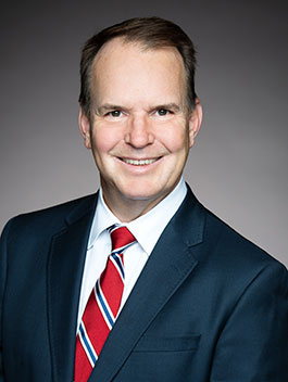 Headshot of Steven MacKinnon