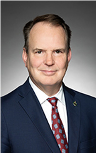 Headshot of Steven MacKinnon