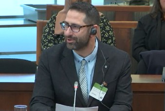 Photo of the Ombudsperson at the Standing Committee on Justice and Human Rights.