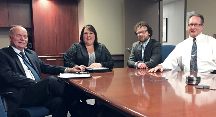 Image of the Taxpayers’ Ombudsman with three members of the senior management team at the Winnipeg Tax Services Office, Prairie Region, Canada Revenue Agency