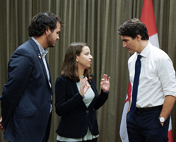 Two PMYC members the Prime Minister Justin Trudeau