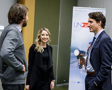 PMYC members speaking with the Prime Minister