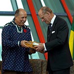 The Duke of Edinburgh receiving a gift from a First Nations' member.