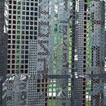 Visitors are shown inside a large cube structure made of metal perforated with inscribed words