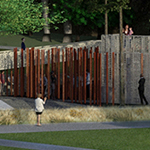 Overhead view of Memorial from a distance showing metal cube structure surrounded by slender bronze columns