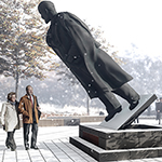 Visitors approach a large statue of Vladimir Lenin that appears to be toppling forward