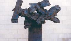 Photo of an abstract cast iron sculpture.