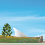 There are two images, one on top of each other. The first is berm covered with grass and wild flowers with a stone opening. Behind it we see a white translucent curved shape. There is a large green pine tree on the left and the Peace Tower in the background. The lower image is from a different angle, where we see the Canadian War Museum through the translucent curved shape.