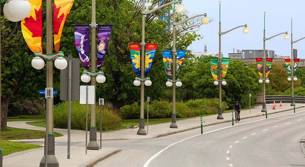 Seven banners running along Confederation Boulevard