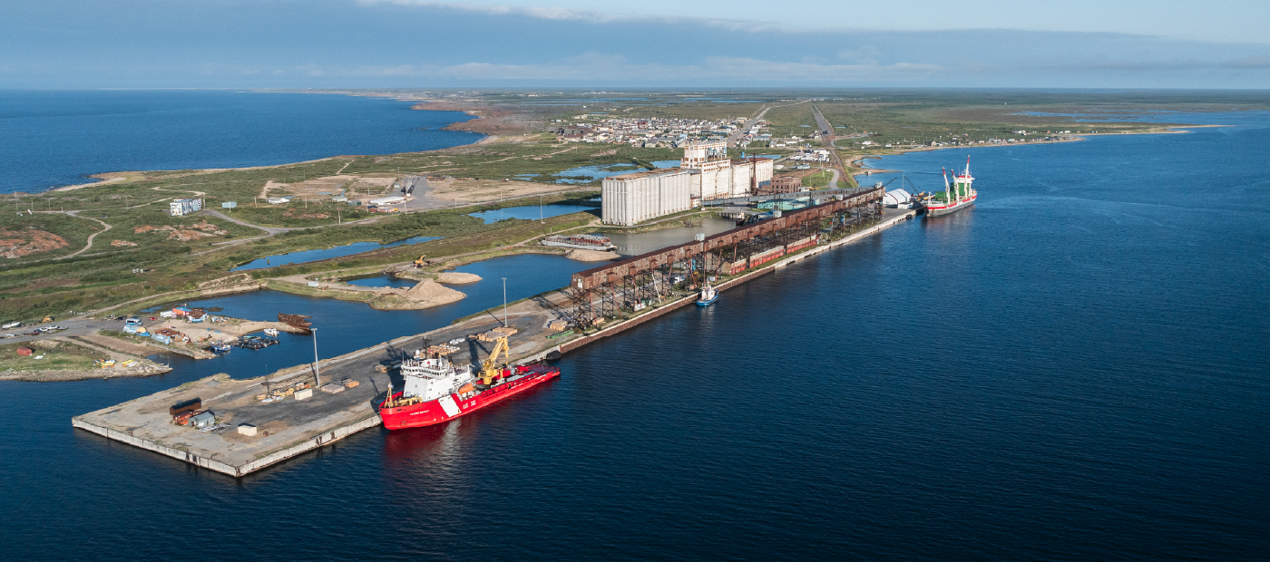 A Canadian Coast Guard vessel in water, at the Port of Churchill