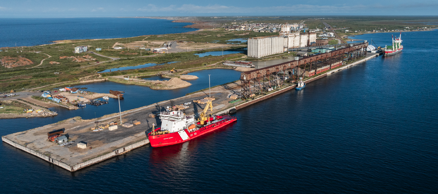 A ship in water, docked at the Port of Churchill