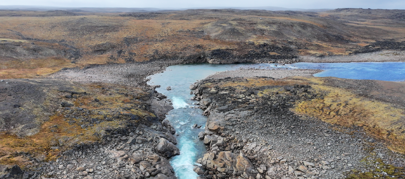 A river running through a rocky area in Iqaluit