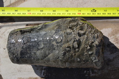 This permafrost core sample from near the trail contains gravel and soil particles of different sizes, and a lot of ice.