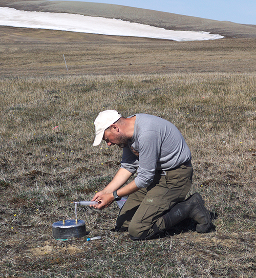 Johann Wagner sampling trace gases at Cape Bounty, Melville Island, Nunavut.