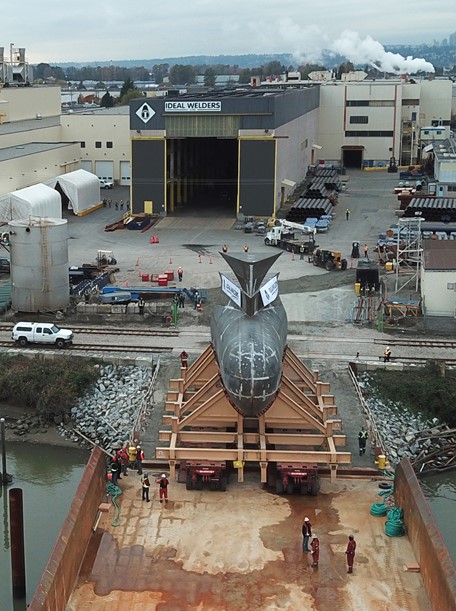 Arial view of the bulbous bow on supports in front of the Ideal Welders shipyard
