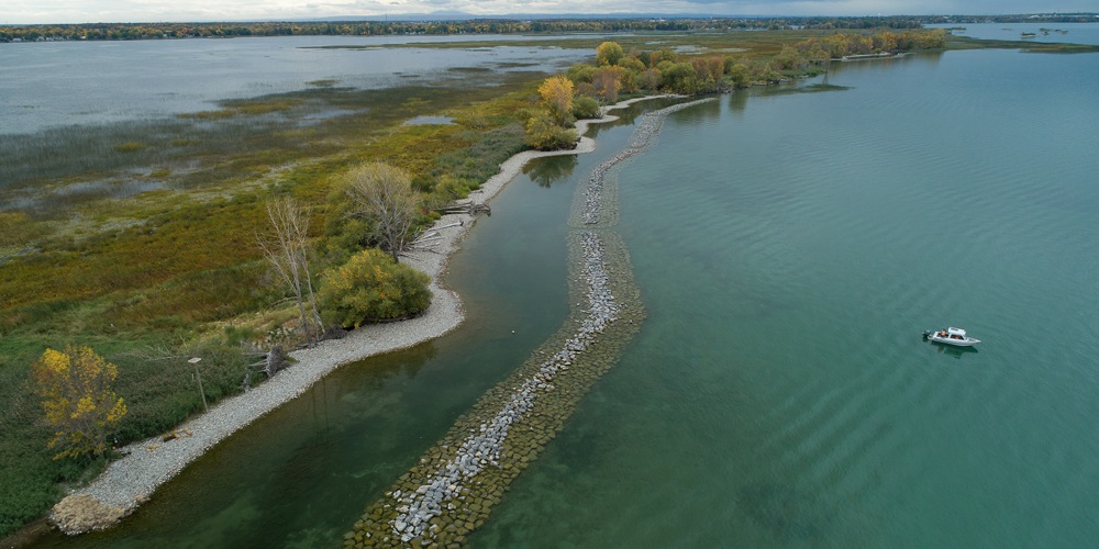 Aerial photo of island surrounded by water in the Îles de la Paix archipelago.