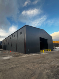 Exterior view of the Muncho Lake sand and salt storage facility at the Muncho maintenance yard in British Columbia.