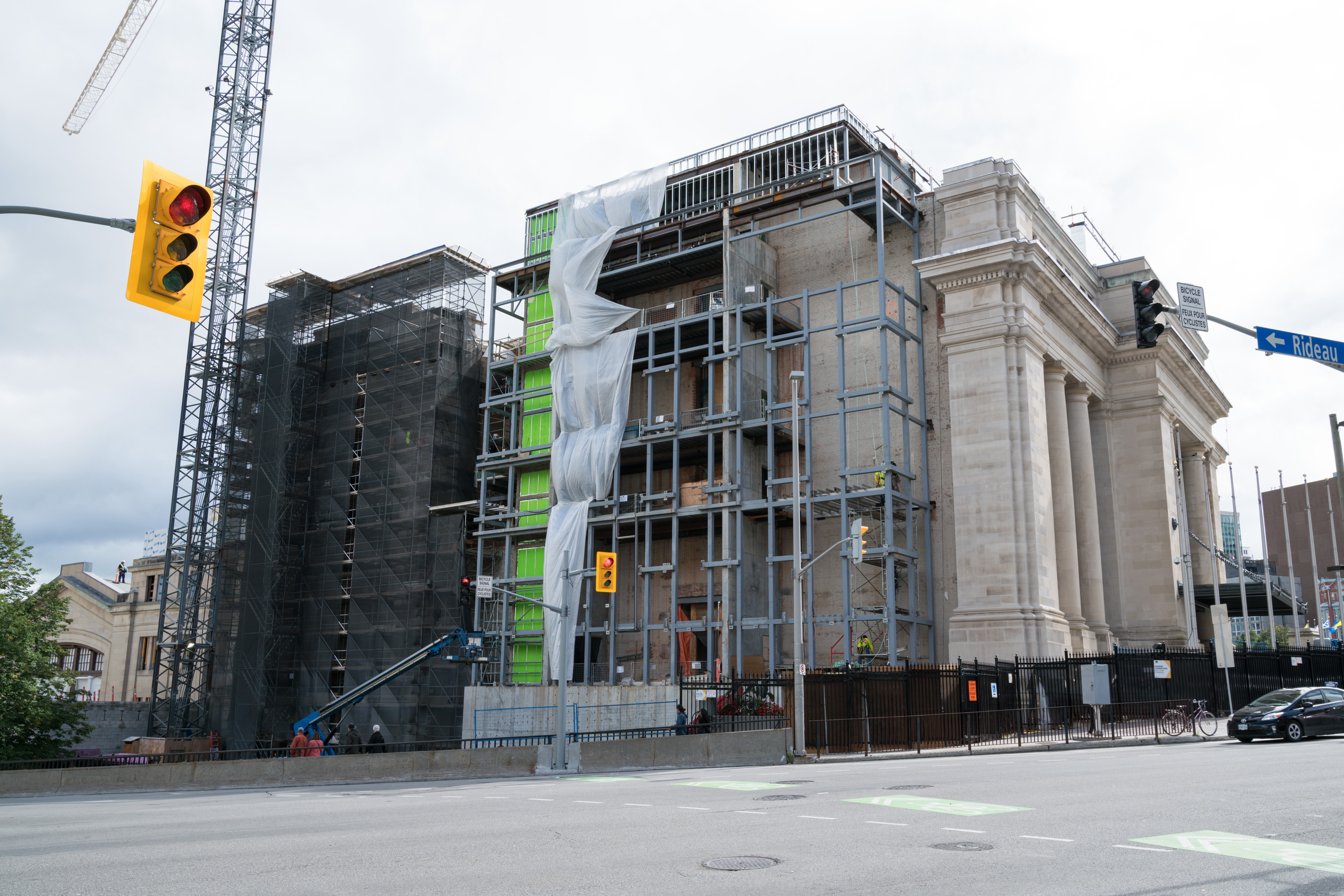 2017 - The same exterior view of the building. There is scaffolding and the new east addition is being built.