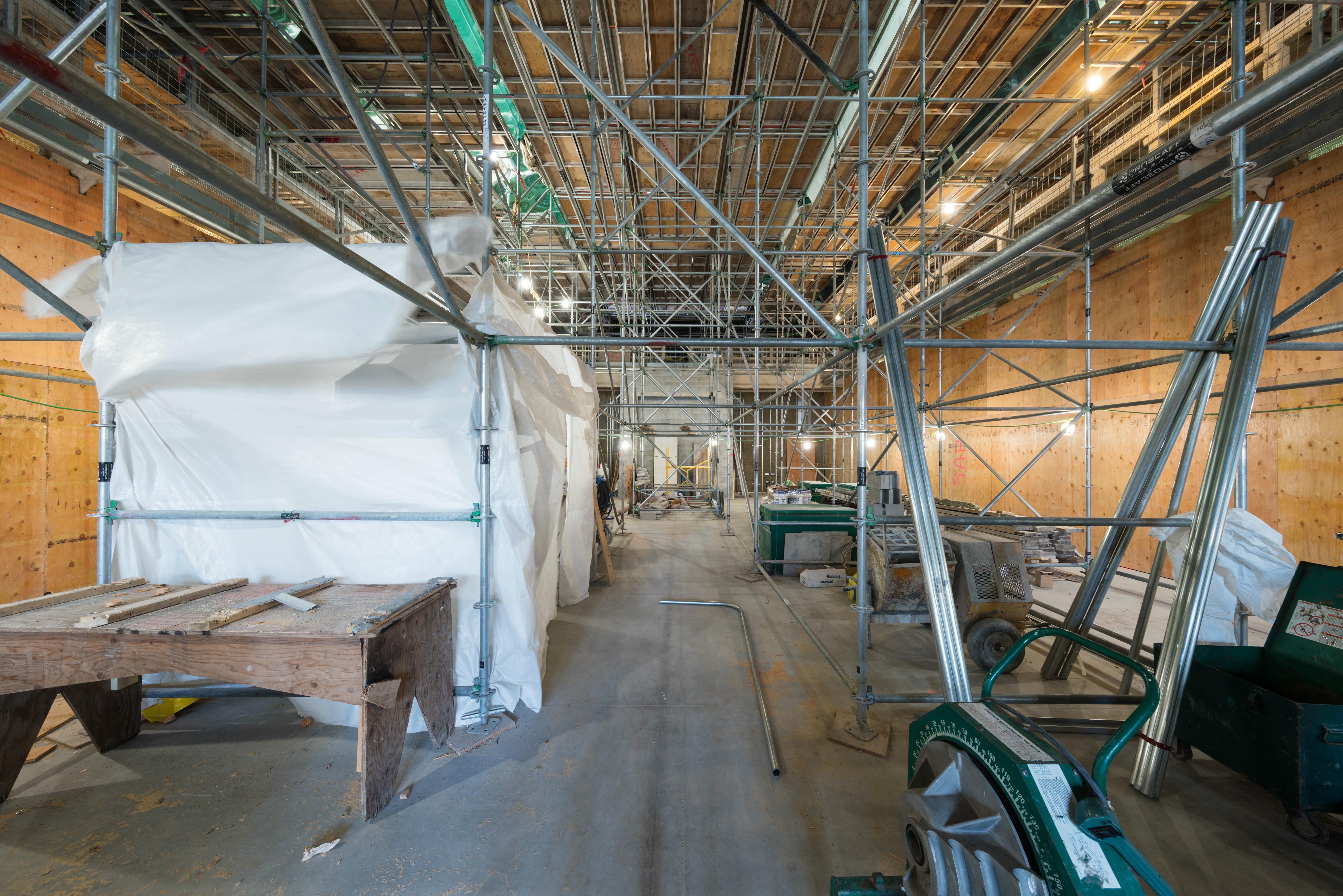 2017 - The same room with completed concrete floor. There is scaffolding to allow workers to restore the ceiling.