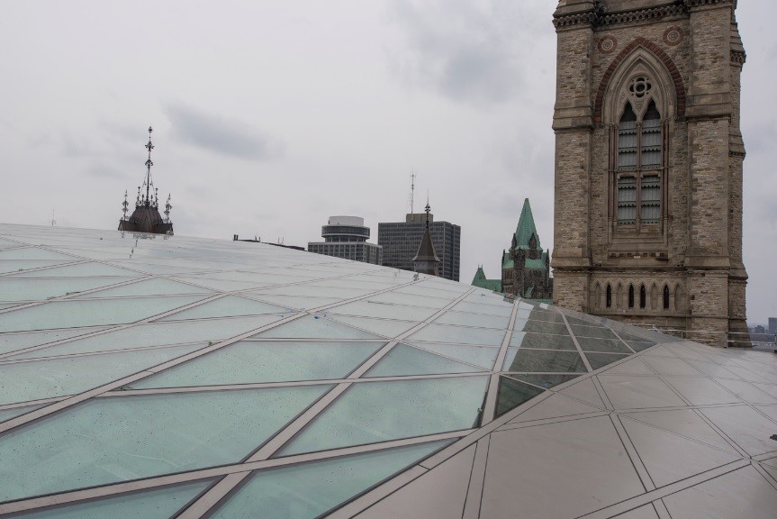 View enlarged image of an exterior view of a glass roof.