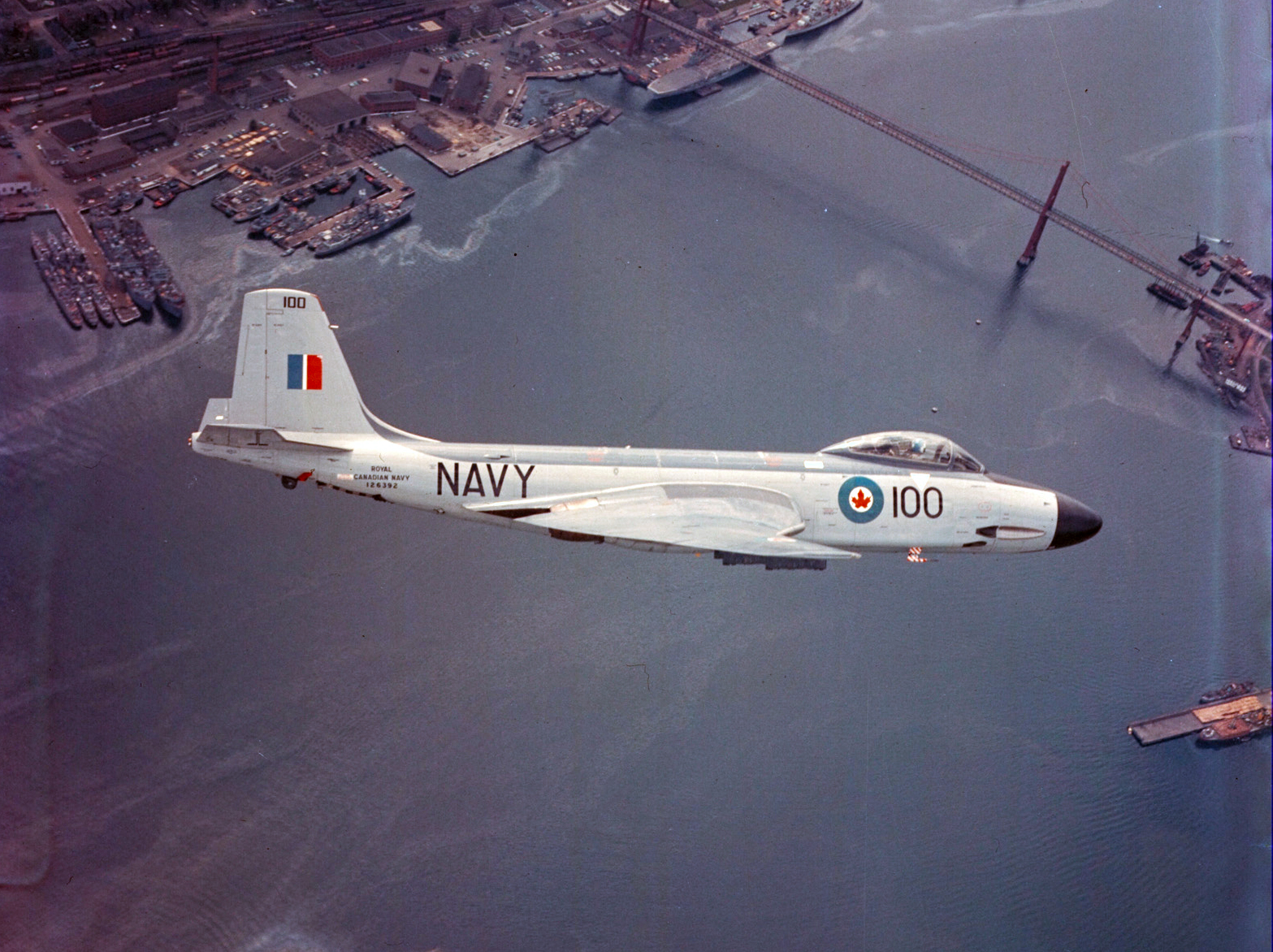 A Banshee flies over Halifax Harbour in Nova Scotia. Phtoto: DND Archives, RNC-131