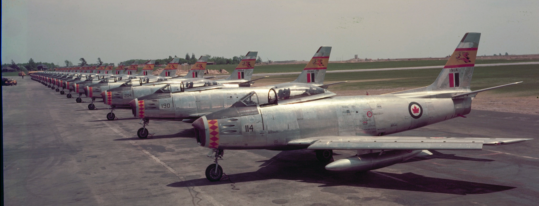 F-86 Sabres from 439 Squadron are lined up on the tarmac at Uplands in Ottawa. PHOTO: DND Archives, PC-81 