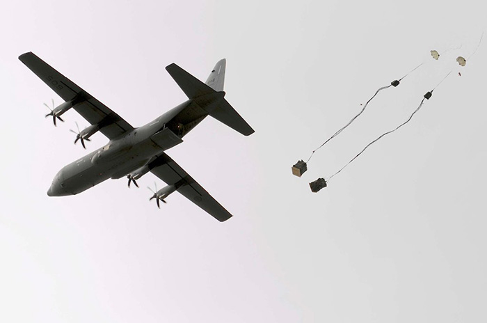 CC-130J paradropping cargo over Petawawa ranges