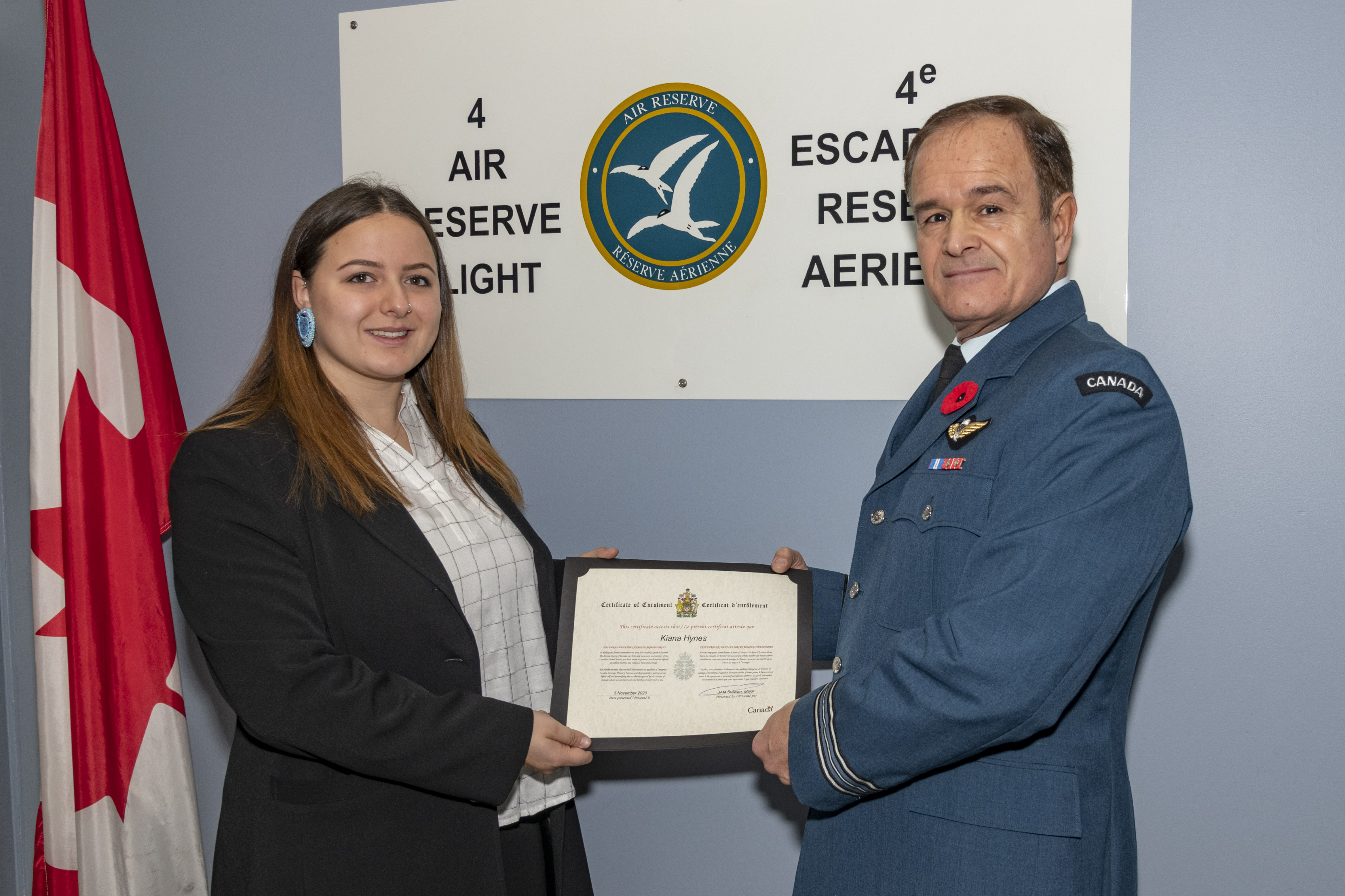 Aviator Kiana Hynes was enrolled in the RCAF Reserve at 4 Wing with Major John Sullivan, 4 Wing Air Reserve Flight Commander (at right).