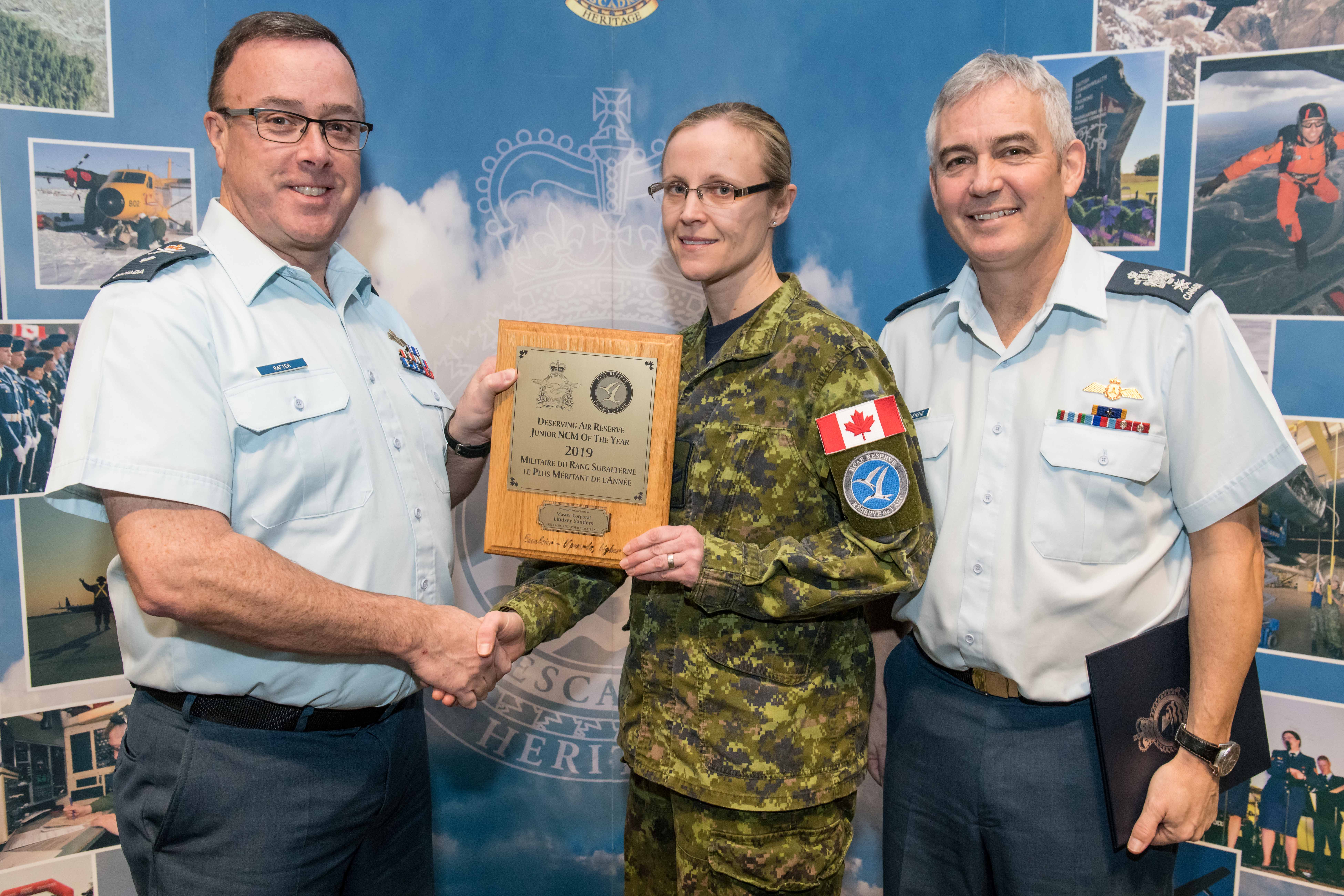 Master Corporal Lindsey Sanders is presented the 2019 RCAF Reserve Junior NCM of the Year Award