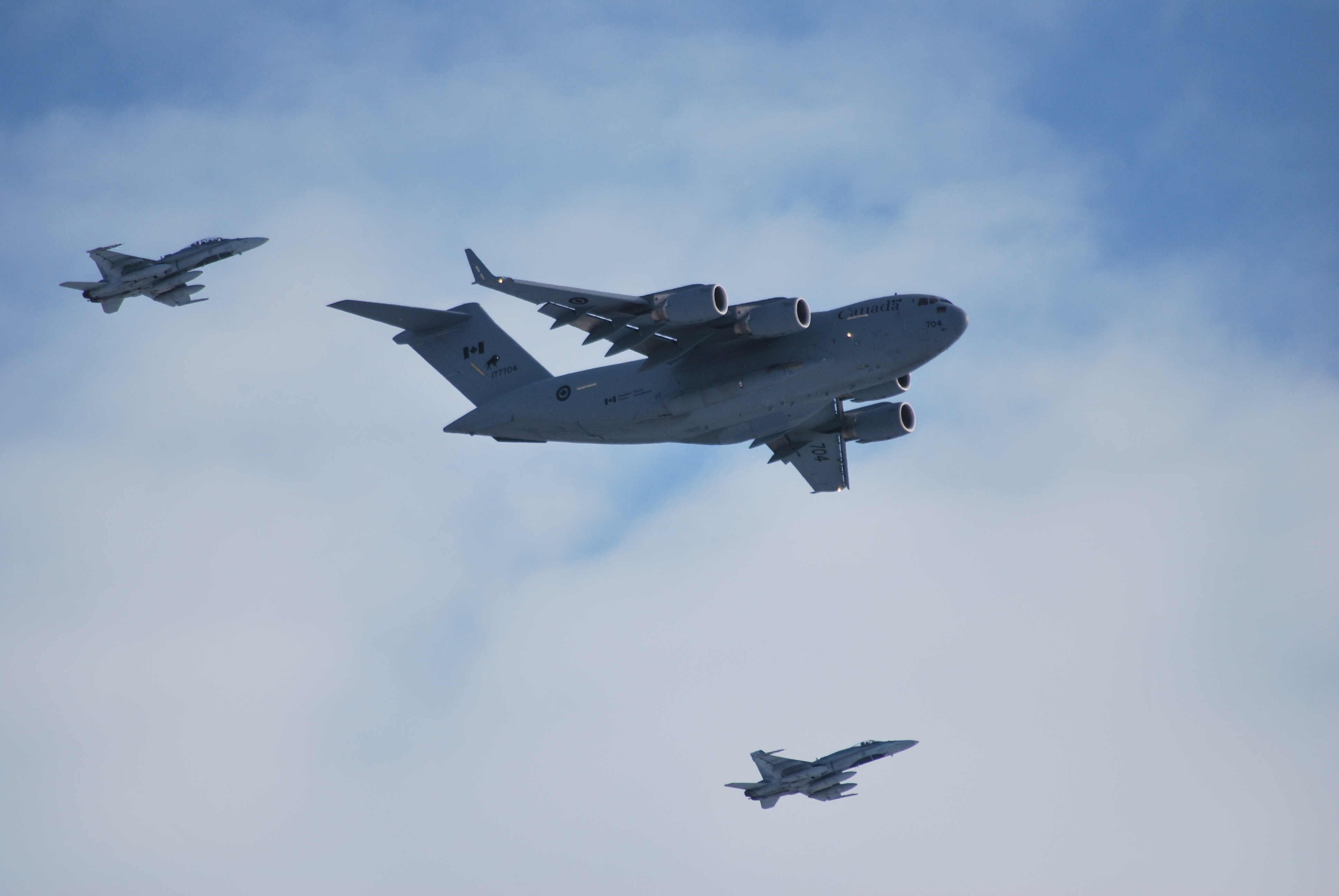 A CC-177 Globemaster III from 429 Transport Squadron, piloted by Captain Capt Dave Hicks, arrives in Ottawa on March 18, 2014. The last Canadian troops to leave Afghanistan were onboard the historic flight. The Globemaster was escorted by two CF-18 Hornet fighter jets from 425 Tactical Fighter Squad