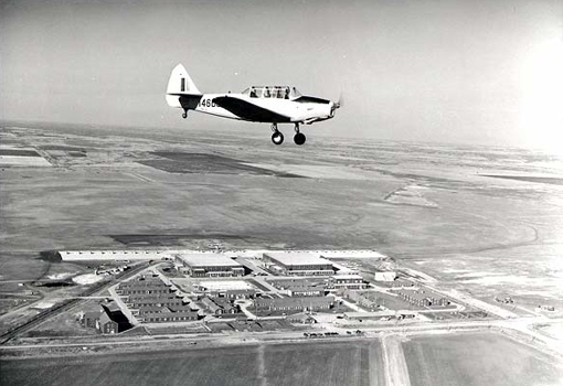 A Fairchild Cornell overflies No. 19 Elementary Flying Training School at RCAF Virden in Manitoba in October 1944. PHOTO: Nicholas Morant, DND Archives,