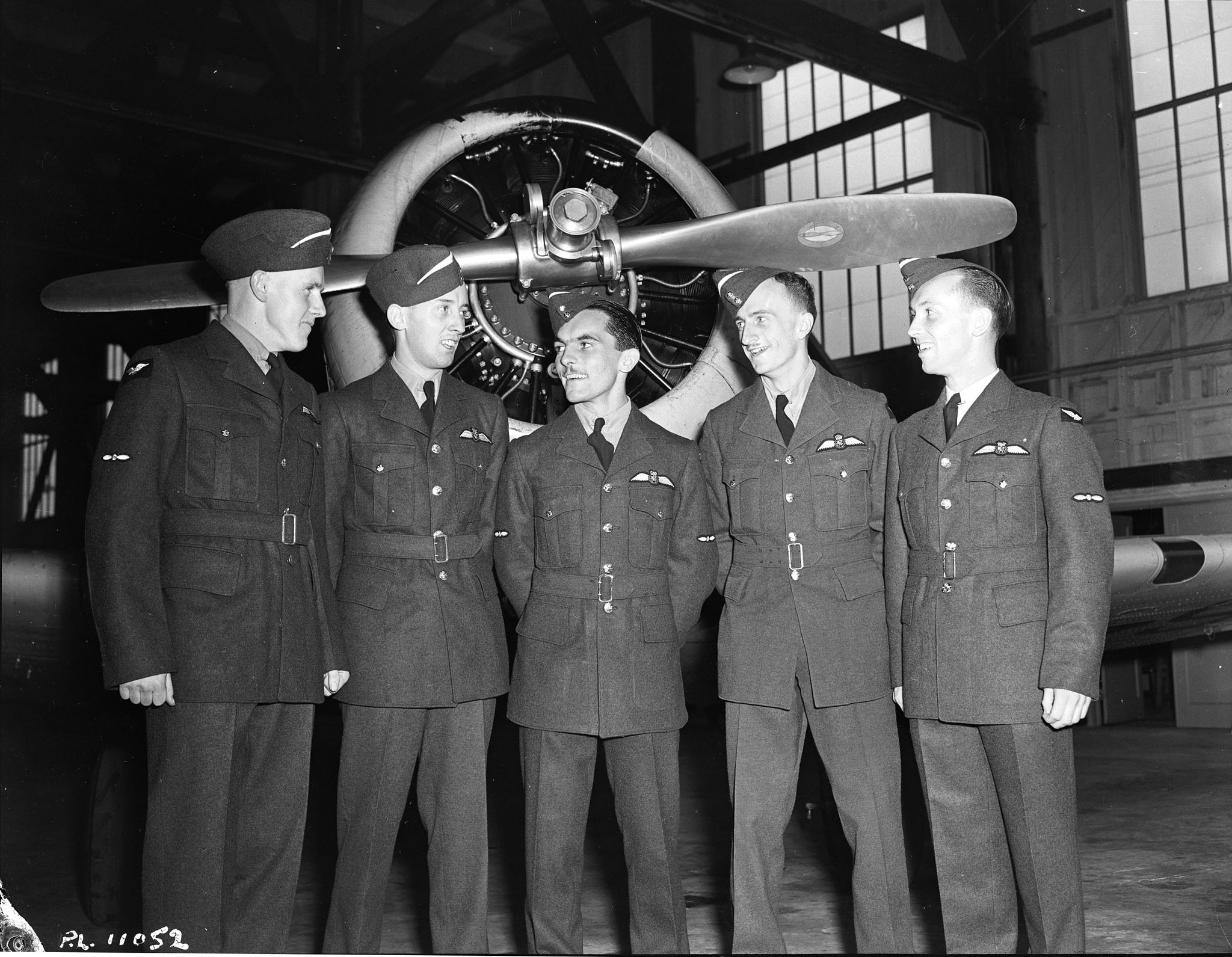 Toronto, Ontario, pilots Morrison (left), Nixon, Regan, Richards and Riddell stand for a photograph to commemorate their graduation from RCAF No. 2 Service Flying Training School at Uplands, Ontario, on August 28, 1942. PHOTO: DND Archives