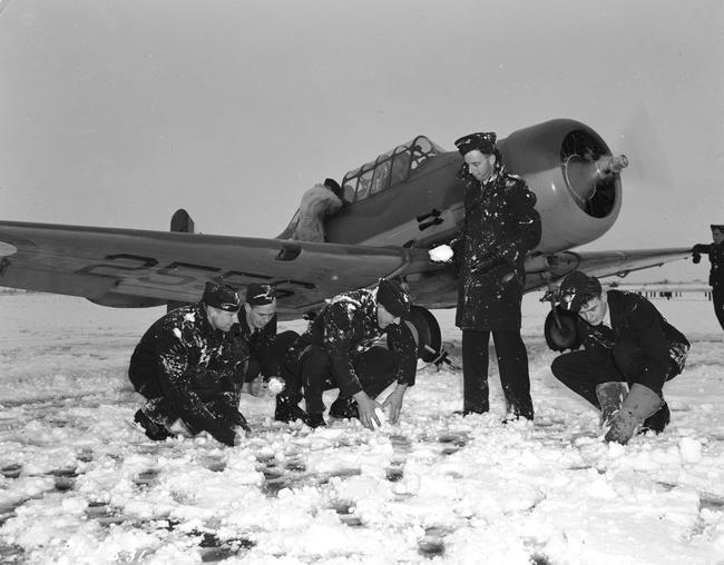 Royal Australian Air Force pilots make snowballs at No. 2 Service Flying Training School RCAF Uplands, Ontario, in November 1940. PHOTO: DND Archives
