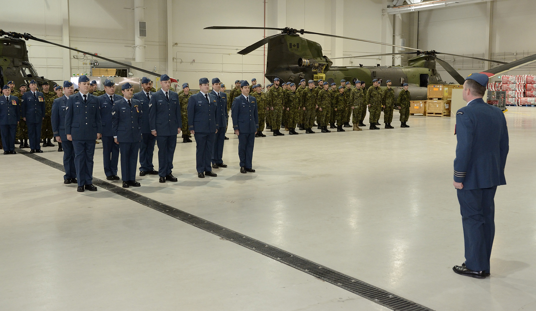 Lieutenant-Colonel Chris McKenna, commanding officer of 450 Tactical Helicopter Squadron, takes command of the parade during the graduation ceremony of newly qualified pilots, flight engineers and loadmasters on February 8, 2016, at CFB Petawawa.