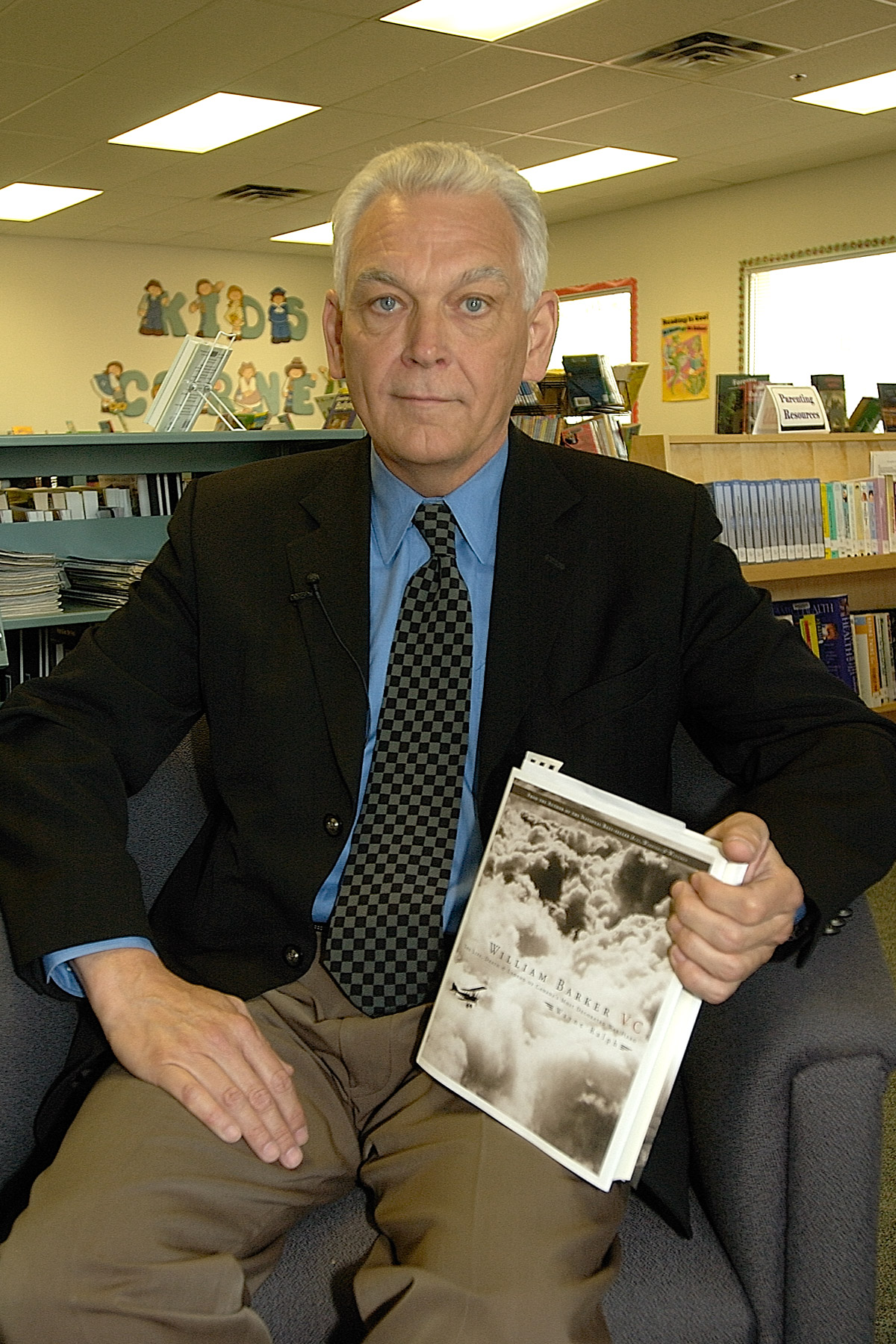 Author Wayne Ralph with his definitive biography “Barker VC: The Life, Death and Legend of Canada’s Most Decorated War Hero”, originally published in 1997, republished in a new illustrated edition in 2007. PHOTO: Master Corporal Peter Simpson, LE2007-0149