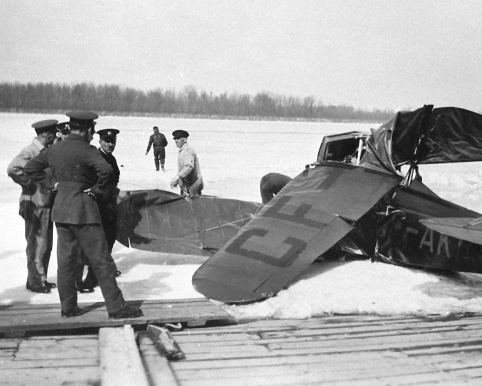The wreckage of Fairchild KR-21, CF-AKR, on the ice of the Ottawa River on March 12, 1930. Wing Commander (retired) William Barker died in the crash. PHOTO: DND Archives, RE74-166