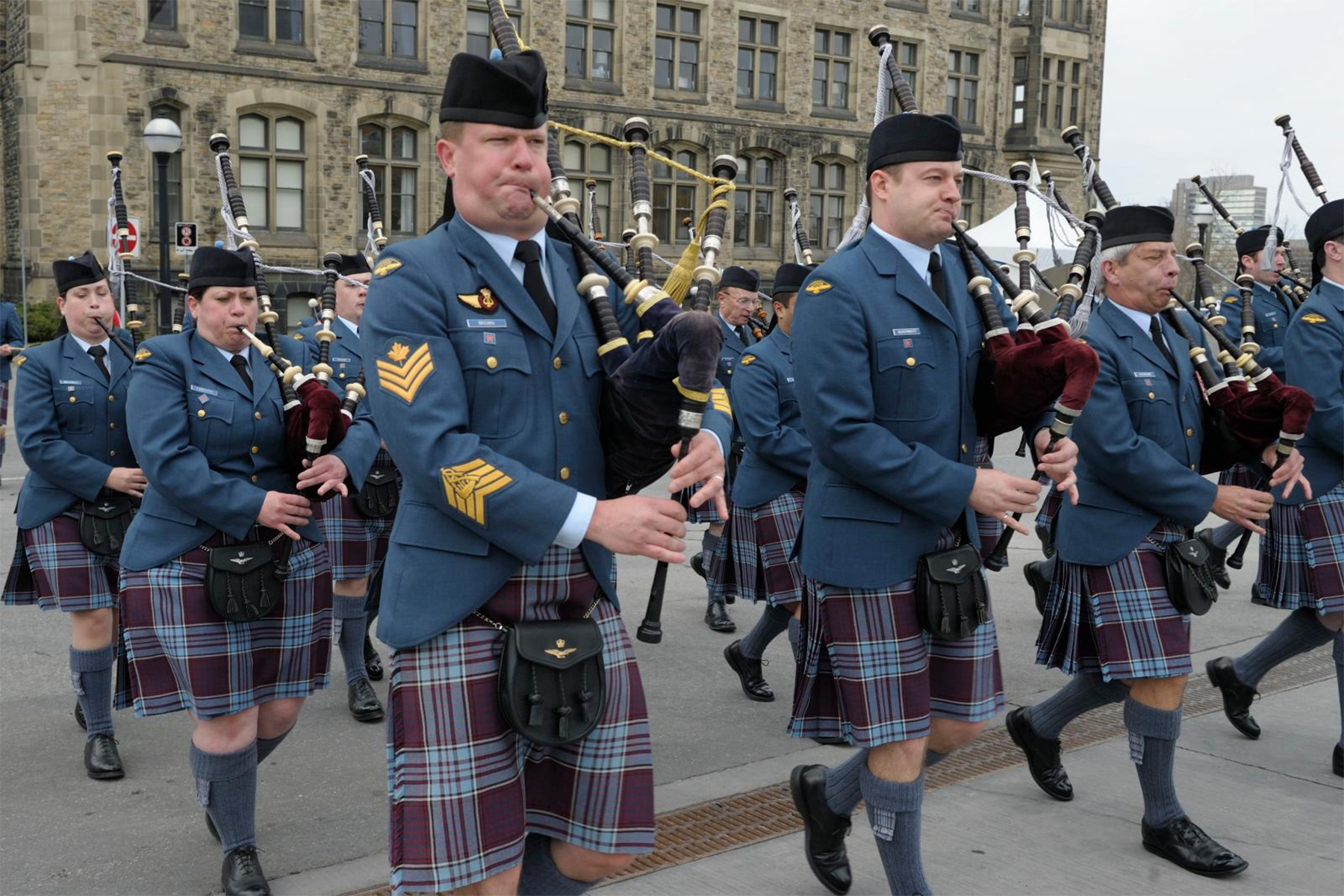 The Royal Canadian Air Force Pipes and Drums parade on Parliament Hill in Ottawa, Ontario, in 2014. PHOTO: DND, FA2014-1008-01