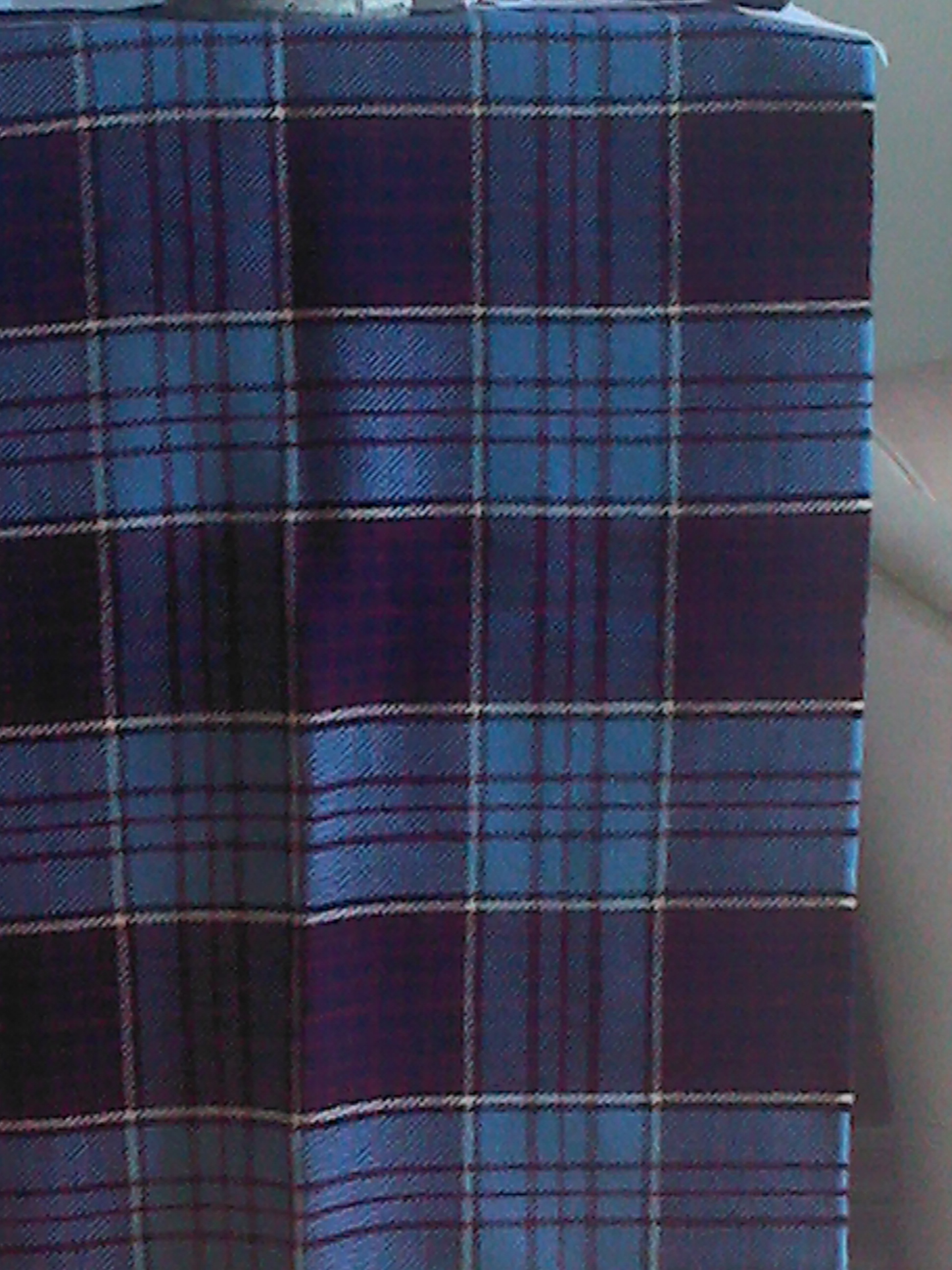 The sole remaining piece of the original 16 yards (14.6 metres) of Royal Canadian Air Force tartan produced in 1942. This photo was provided by the son of Squadron Leader Bill Williamson, who was band officer at 9 Service Flying Training School at Summerside, Prince Edward Island, when Group Captain Elmer G. Fullerton, the school’s commanding officer, developed the concept for an RCAF tartan. Squadron Leader Williamson was tasked with finding a weaver who could produce samples for approval. PHOTO: Keith Williamson