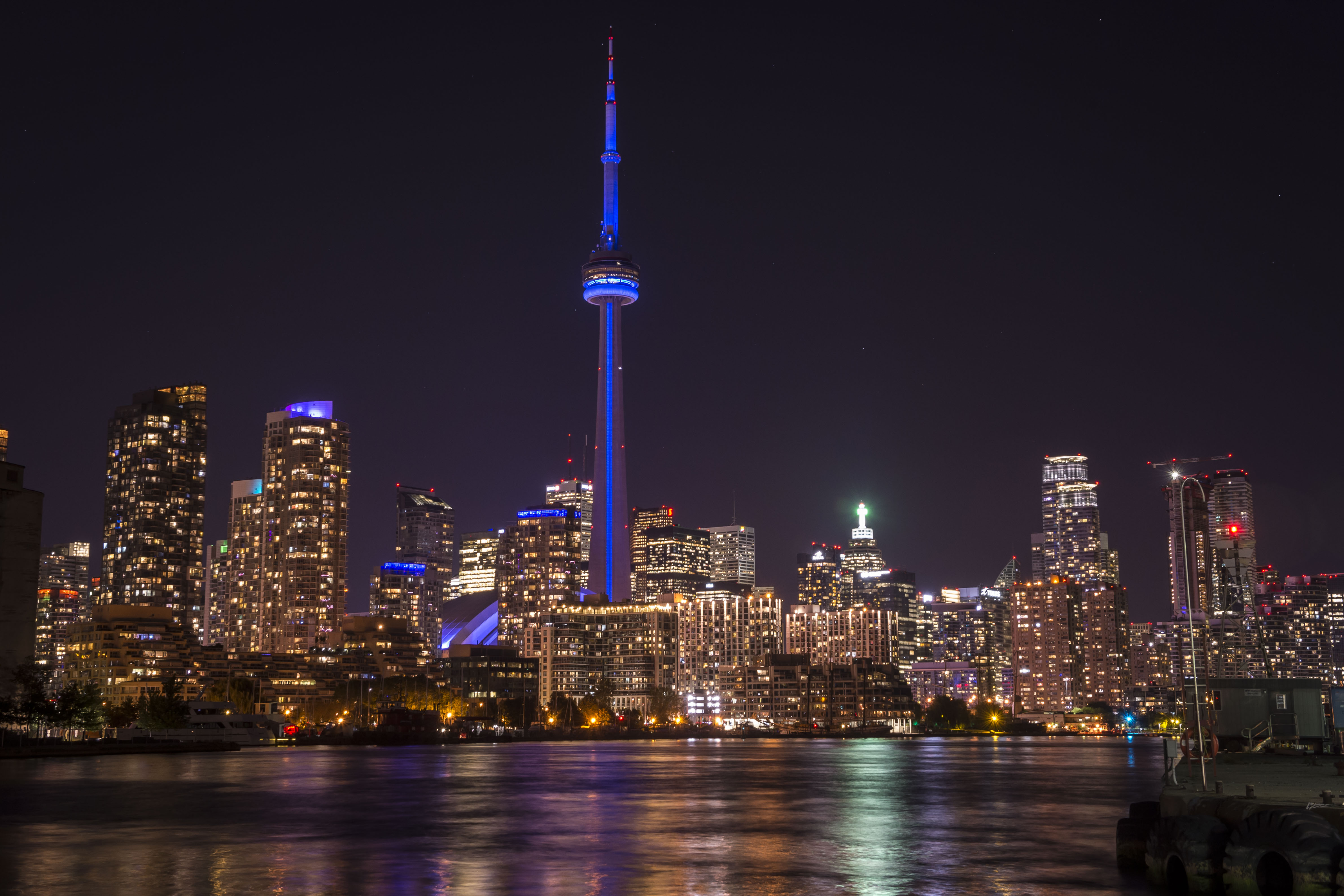 On August 31, 2017, the CN Tower is lit up in RCAF blue to celebrate "Royal Canadian Air Force Day" in Toronto and the presentation of new Colours to the RCAF at Nathan Phillips Square on September 1, 2017. PHOTO: Corporal Alana Morin, FA03-2017-0111-001