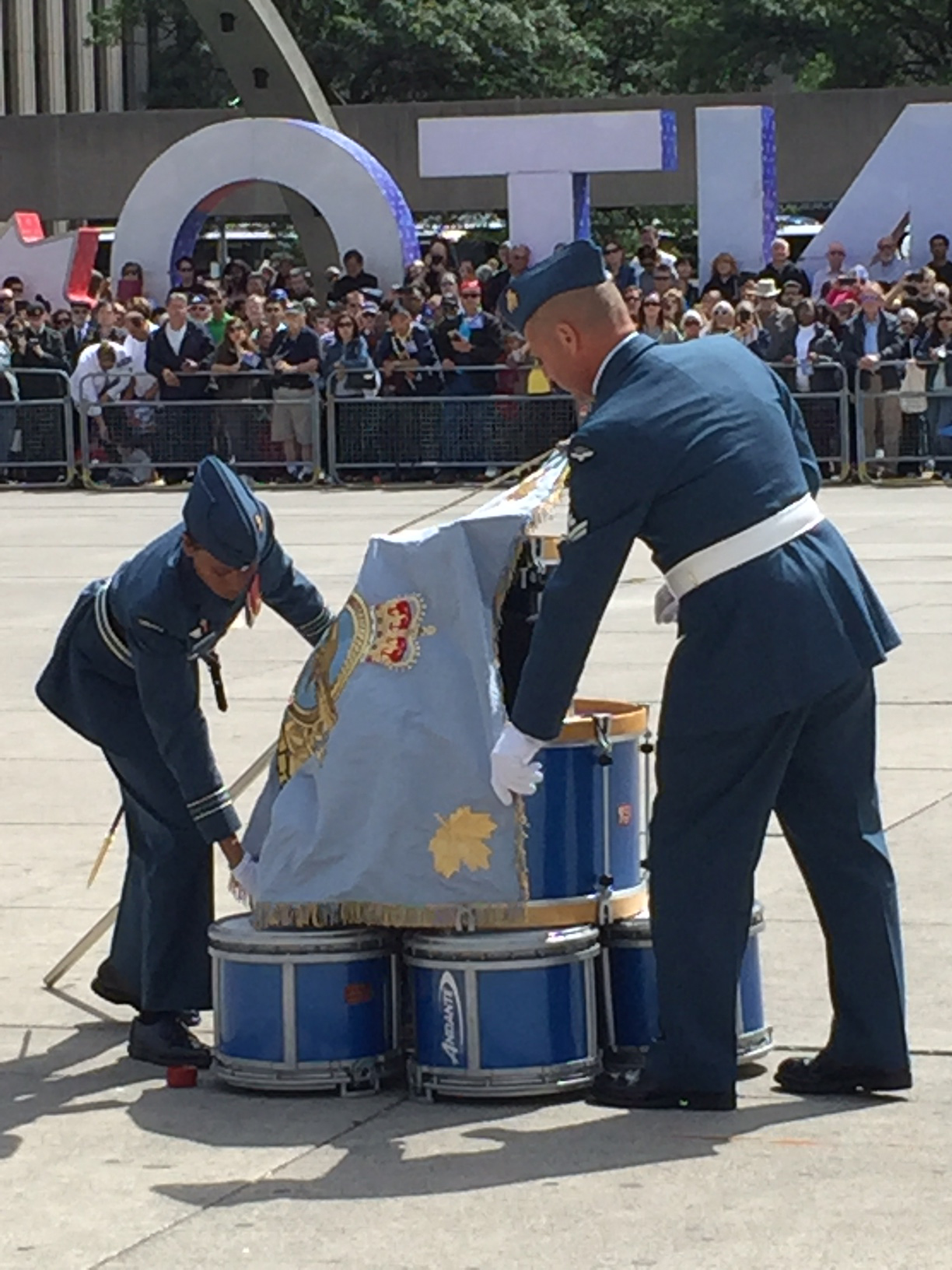 The new RCAF Colour is draped over the piled drums before being consecrated by the RCAF chaplain. PHOTO: Major Holly-Anne Brown