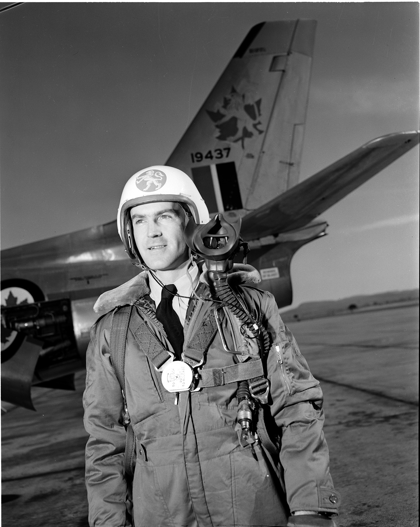 On February 2, 1953, Flying Officer J.B. Mullin of Montreal stands to the side of his CF-104 Starfighter supersonic fighter at St. Hubert, Québec. Used primarily as a ground attack, low-level strike and reconnaissance aircraft, the Starfighter served 427 Squadron and the RCAF beginning in the early-1960s, replacing its predecessor, the F-86 Sabre. PHOTO: DND Archives, PL-56148
