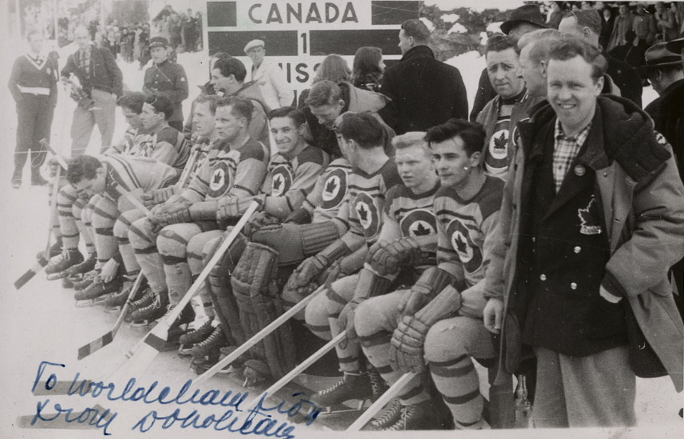 The RCAF Flyers hockey team on the players' bench during a game against the Swiss national men's hockey team at the 1948 Winter Olympic Games in St. Moritz, Switzerland, on February 8, 1948. PHOTO: LAC MIKAN no. 4842050