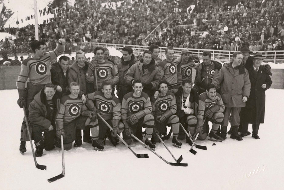 The team photo of RCAF Flyers on the ice after winning the hockey gold medal at the 1948 Winter Olympics in St. Moritz, Switzerland, on February 8, 1948.  PHOTO: LAC MIKAN no. 4842055 