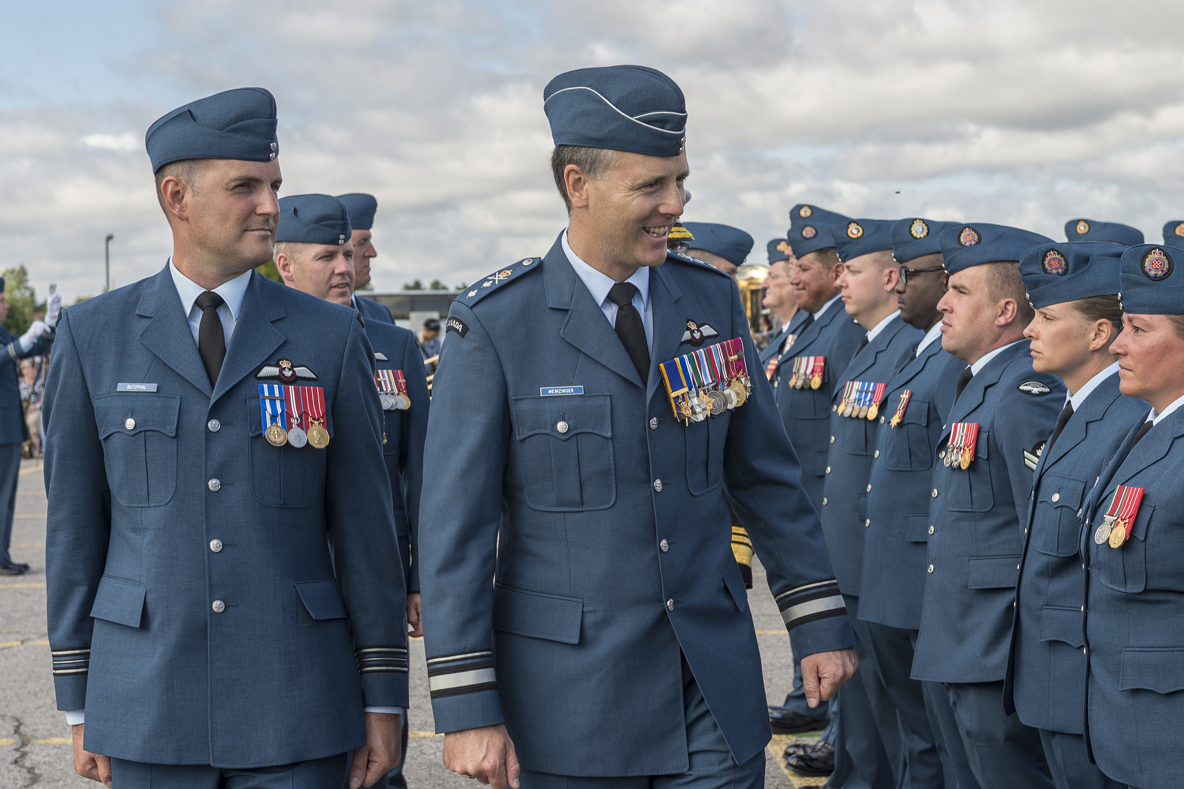 Accompanied by the parade commander, Major Peter Butzphal, Major-General Al Meinzinger, deputy commander of the Royal Canadian Air Force, inspects the airmen and airwomen on parade during the national Battle of Britain ceremony held September 18, 2016, at the Canada Aviation and Space Museum in Ottawa. On May 4, 2018, now-Lieutenant-General Meinzinger took command of the Royal Canadian Air Force. PHOTO: Corporal Alana Morin, FA03-2016-0032-015
