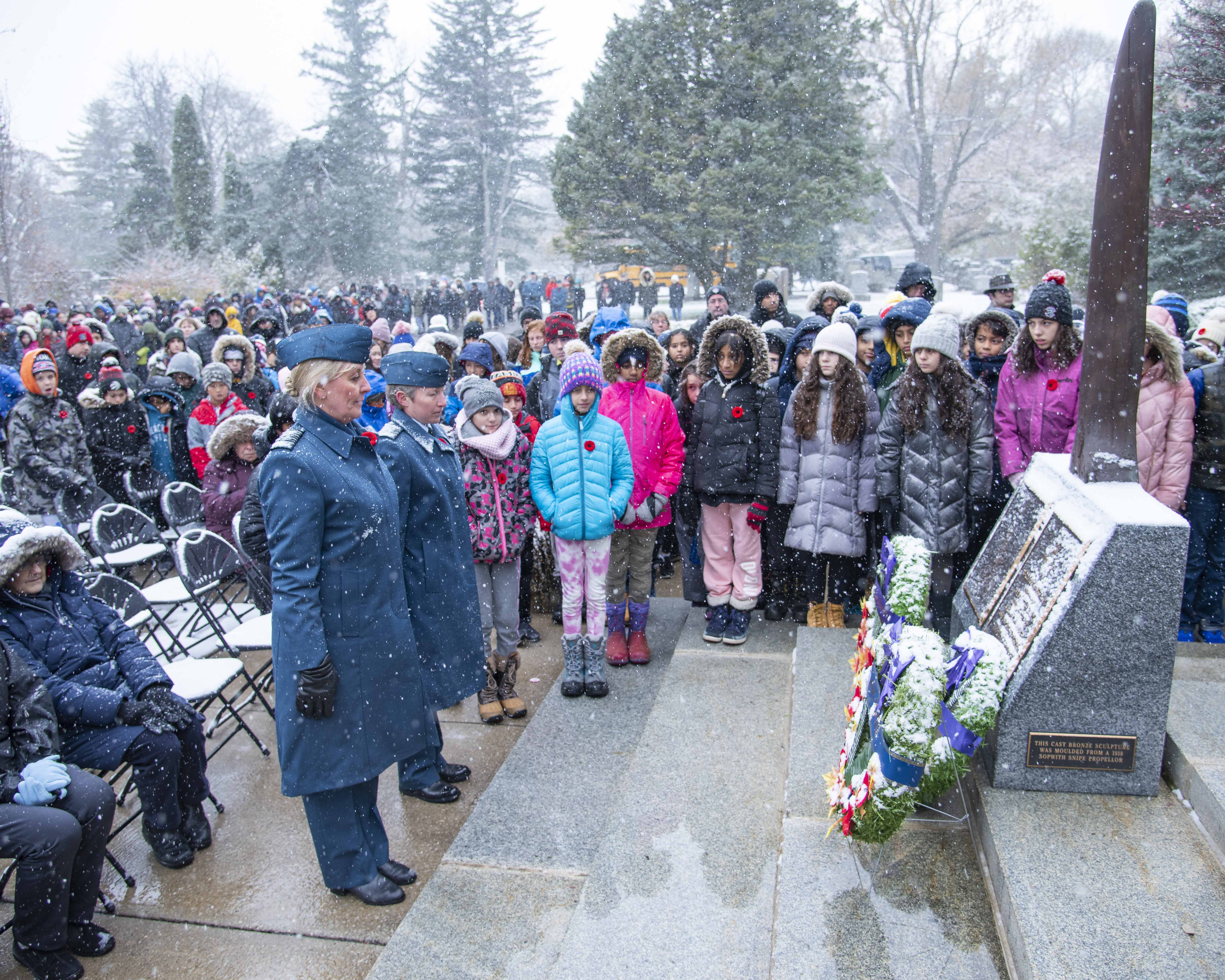 16 Wing’s Honorary Colonel Renee Van Kessel (left) and Lieutenant-Colonel Jennifer Morrison, commander of 16 Wing Borden, Ontario, pause after laying a wreath on behalf of 16 Wing during the 2019 Remembrance Day ceremony held at the mausoleum where Wing Commander William Barker, VC, is interred in Mount Pleasant Cemetery, Toronto. The wreaths are laid in front of a monument commemorating Wing Commander Barker. PHOTO: Corporal Lynette Ai Dang, BM10-2019-0359-031